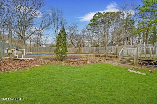 view of yard featuring a wooden deck