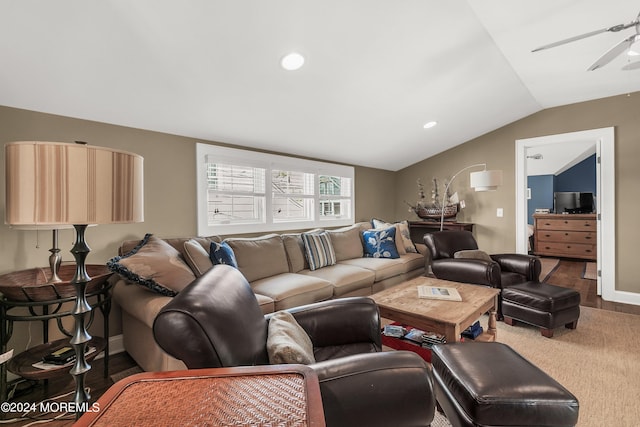 living room with lofted ceiling, wood-type flooring, and ceiling fan