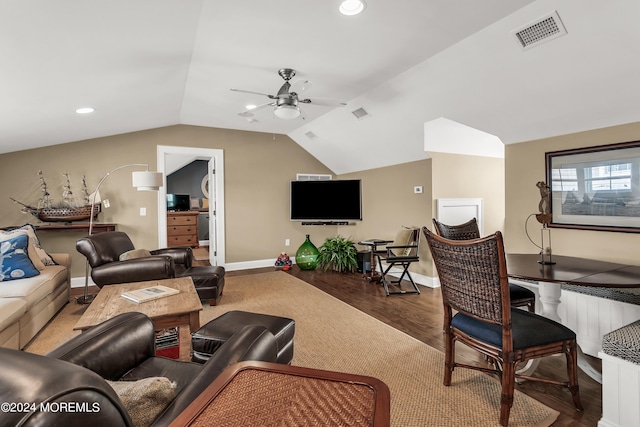 living room featuring vaulted ceiling, hardwood / wood-style flooring, and ceiling fan