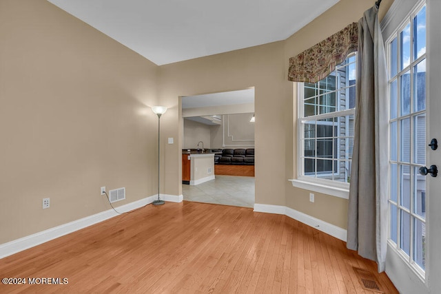 empty room featuring light hardwood / wood-style floors