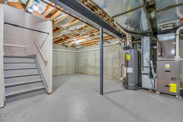 basement featuring heating unit and gas water heater