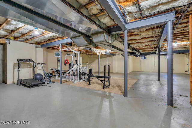 exercise room featuring concrete flooring