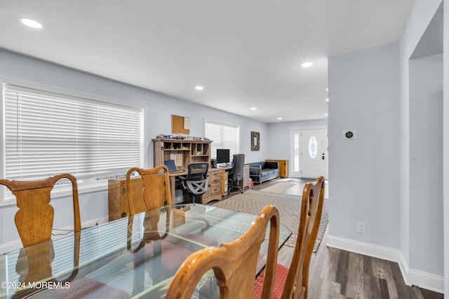 dining room with dark wood-type flooring