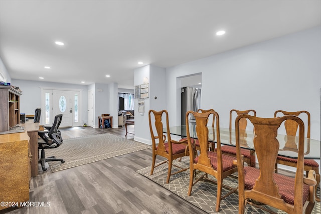 dining room with wood-type flooring