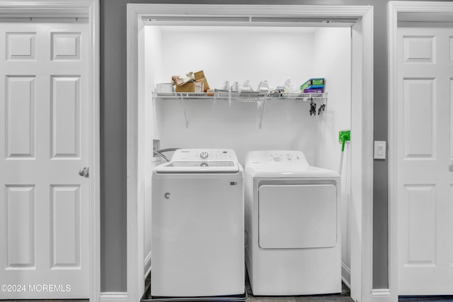 laundry room featuring washer and clothes dryer