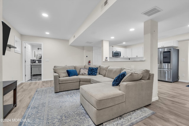 living room with light wood-type flooring