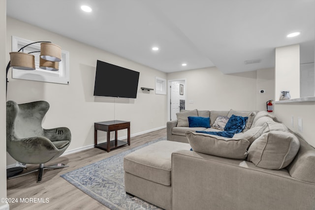 living room with hardwood / wood-style flooring