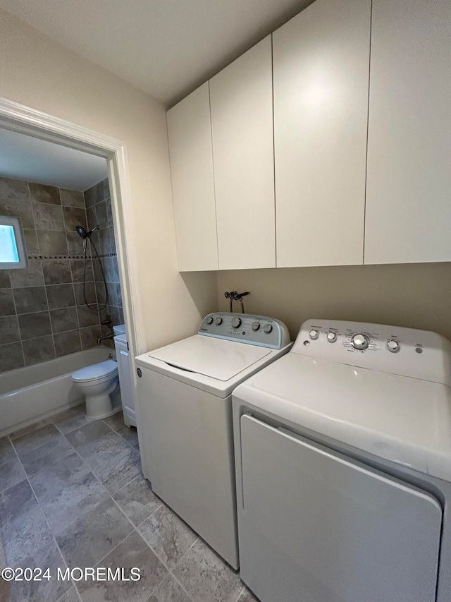 laundry area featuring washing machine and dryer