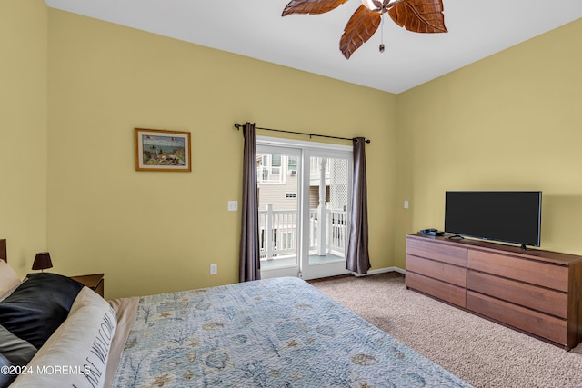 bedroom featuring access to exterior, light colored carpet, and ceiling fan