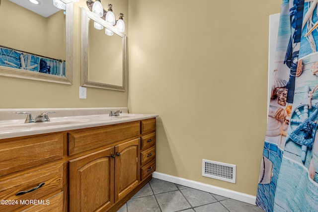 bathroom featuring vanity and tile patterned floors