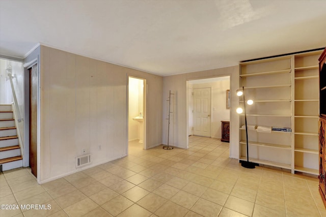 view of tiled spare room