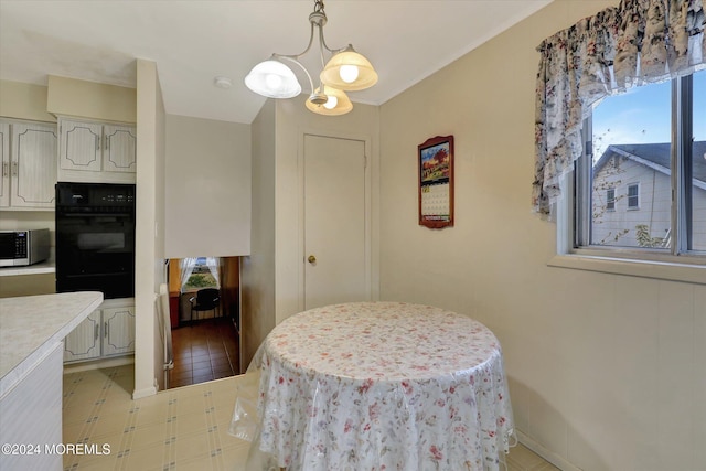 dining room featuring a chandelier