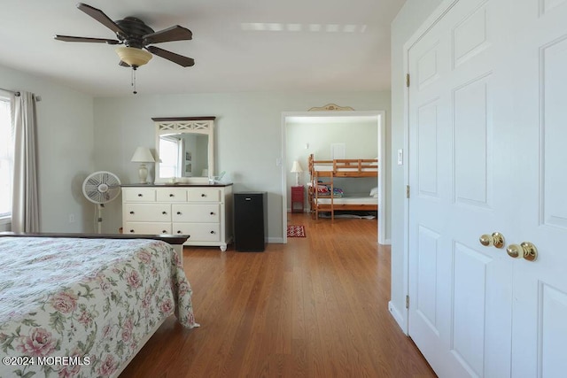 bedroom featuring ceiling fan and wood finished floors