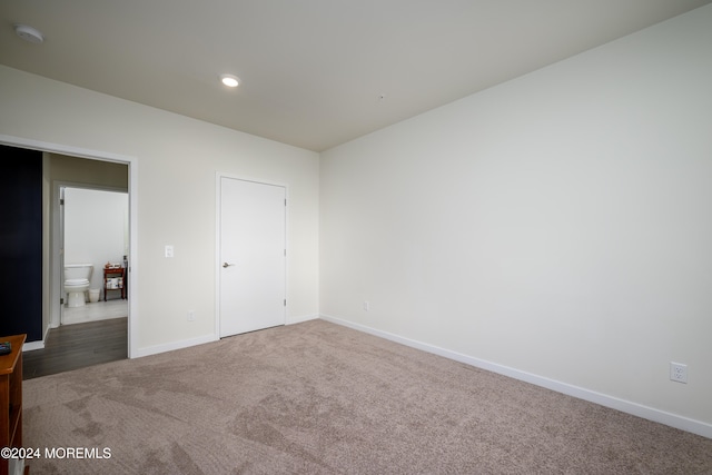 unfurnished bedroom featuring carpet floors