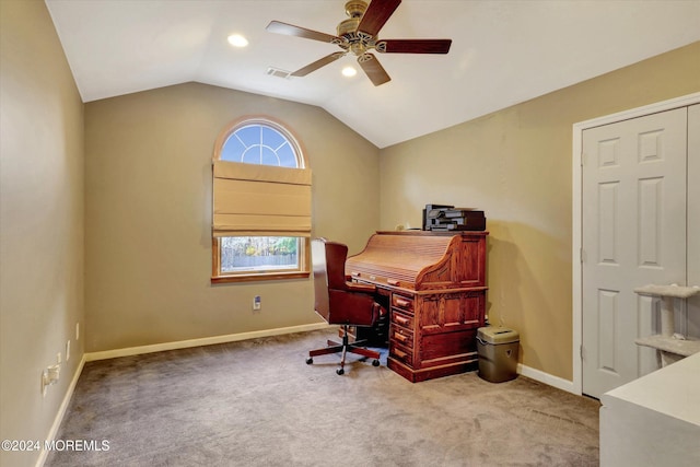 carpeted home office featuring ceiling fan and vaulted ceiling