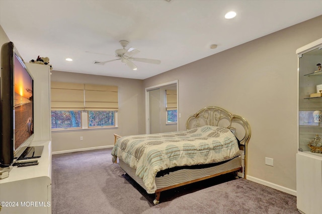 bedroom with ceiling fan and carpet