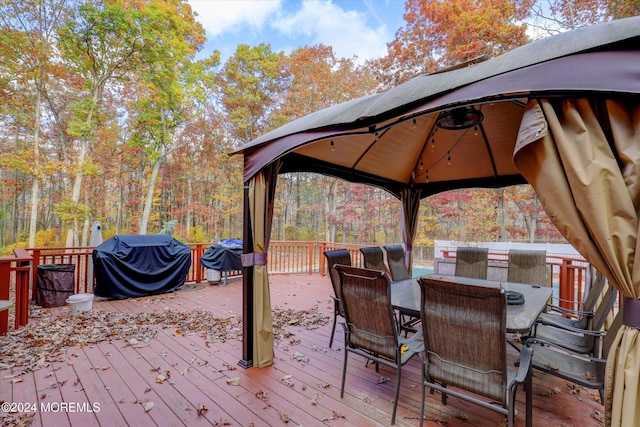 deck with a gazebo and grilling area