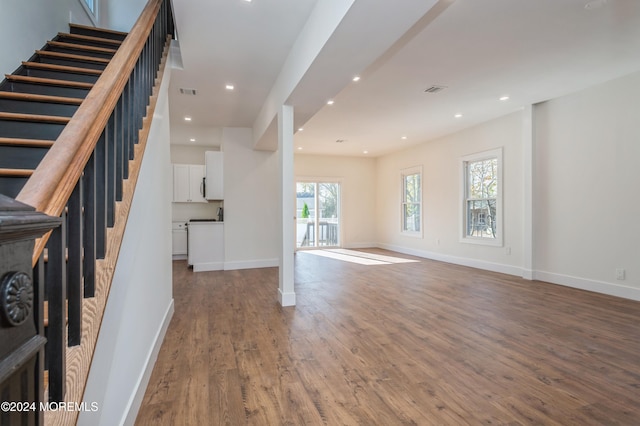 interior space with hardwood / wood-style floors