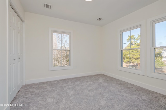 empty room with light carpet