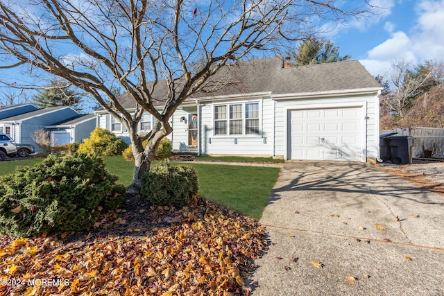 314 Ashford Rd, Toms River, NJ 08755 - ranch-style house with an attached garage, concrete driveway, and a front yard