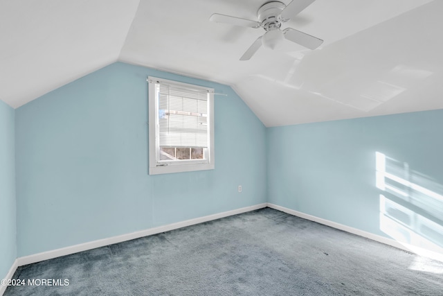 additional living space with ceiling fan, carpet, and vaulted ceiling