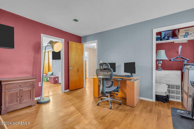 home office featuring light hardwood / wood-style flooring