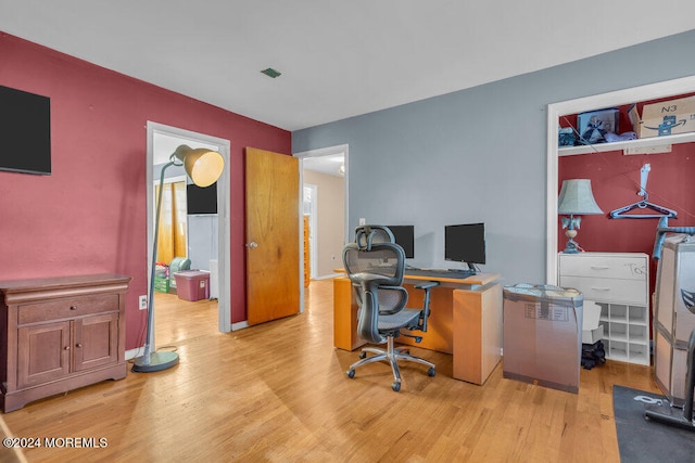 home office featuring light hardwood / wood-style flooring