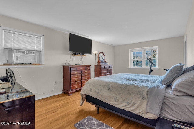 bedroom with wood-type flooring