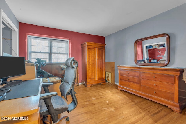 office area with light hardwood / wood-style floors