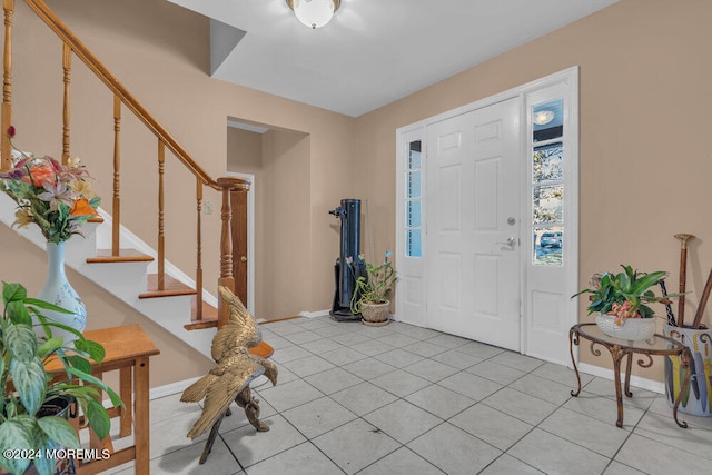 foyer with light tile patterned flooring