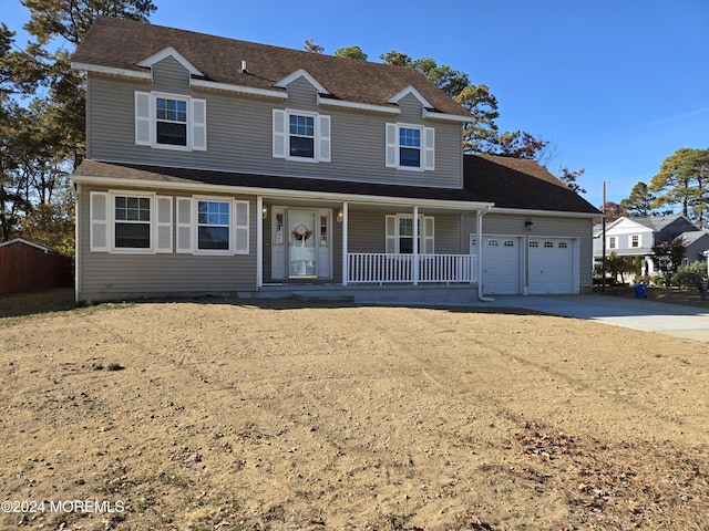 813 Beechmont St, Toms River, NJ 08757 - view of front of property with covered porch, concrete driveway, an attached garage, and a shingled roof