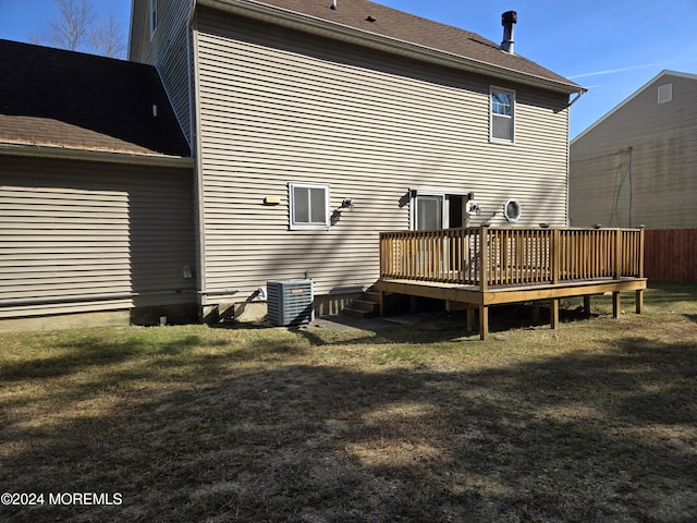 813 Beechmont St, Toms River, NJ 08757 - rear view of house with a wooden deck, central air condition unit, and a lawn