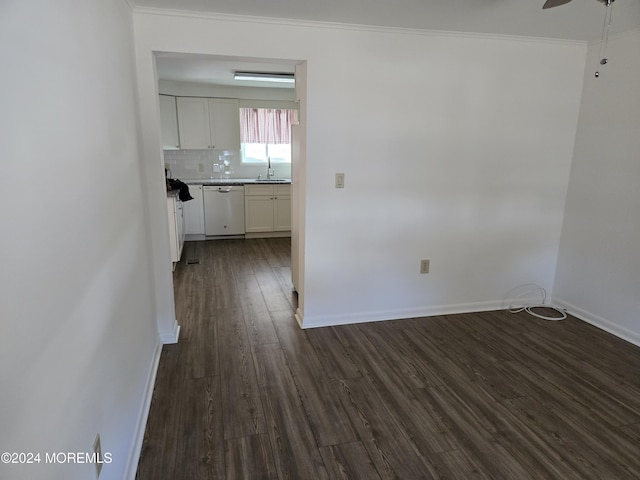 813 Beechmont St, Toms River, NJ 08757 - unfurnished dining area with dark wood-style floors, baseboards, ceiling fan, ornamental molding, and a sink
