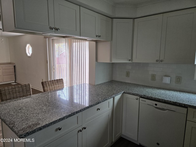 813 Beechmont St, Toms River, NJ 08757 - kitchen with dishwasher, a peninsula, white cabinets, and decorative backsplash