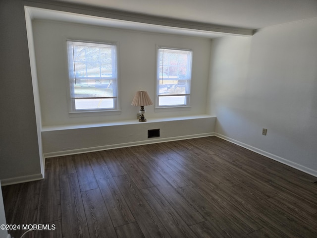 813 Beechmont St, Toms River, NJ 08757 - unfurnished room featuring healthy amount of natural light, dark wood-type flooring, and baseboards
