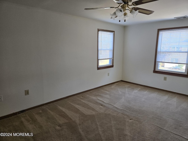 813 Beechmont St, Toms River, NJ 08757 - carpeted empty room featuring crown molding, a ceiling fan, and baseboards
