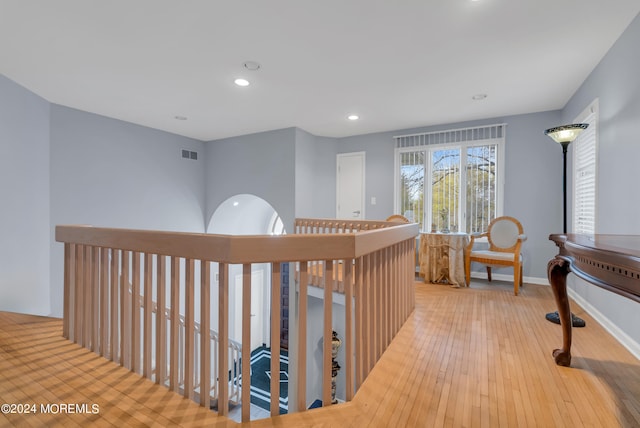 corridor featuring light hardwood / wood-style flooring