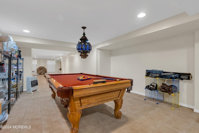 game room with heating unit, light tile patterned floors, and pool table