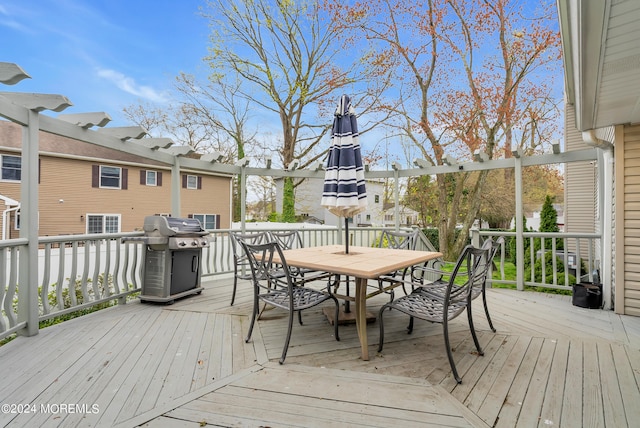 wooden deck with grilling area