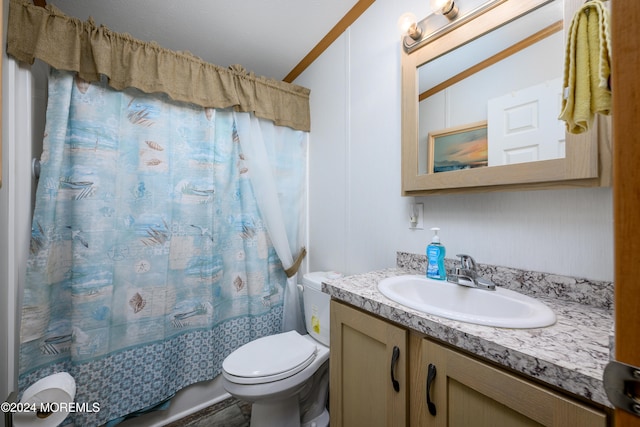 bathroom with wood-type flooring, toilet, ornamental molding, vanity, and curtained shower