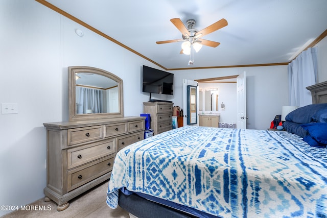 bedroom featuring ensuite bathroom, ornamental molding, carpet floors, and ceiling fan