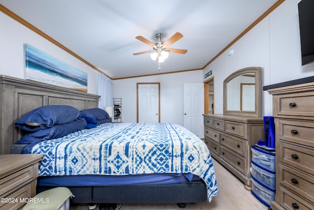 bedroom featuring ornamental molding, light colored carpet, and a ceiling fan