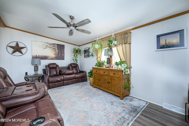 living room featuring ceiling fan, hardwood / wood-style flooring, and crown molding