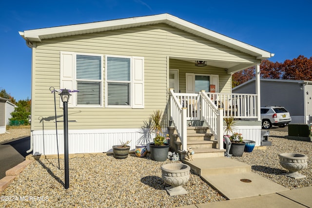 manufactured / mobile home with a porch