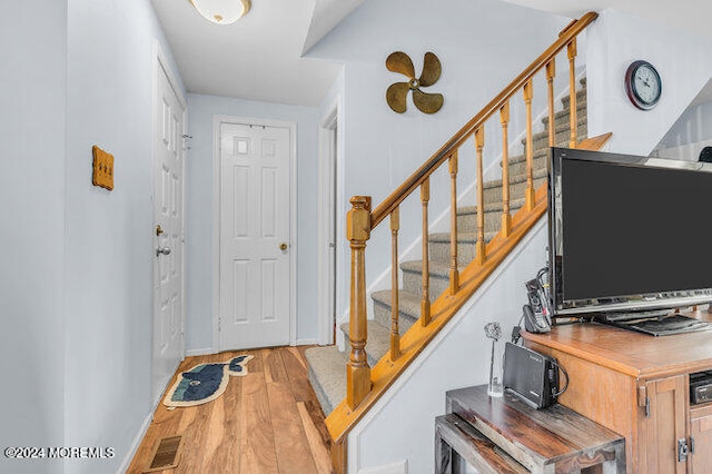 foyer featuring hardwood / wood-style floors