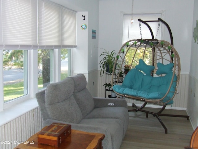 living area with hardwood / wood-style floors