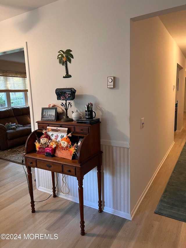 hallway featuring hardwood / wood-style floors