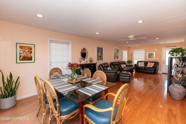 dining space featuring ceiling fan and light hardwood / wood-style floors