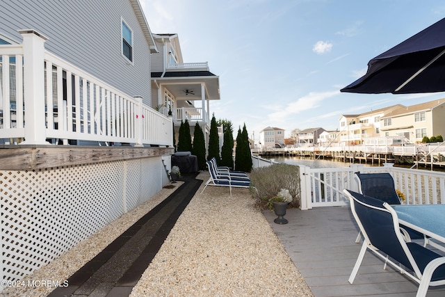 deck featuring a water view