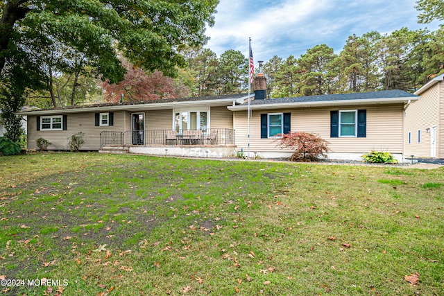 ranch-style house with a front yard